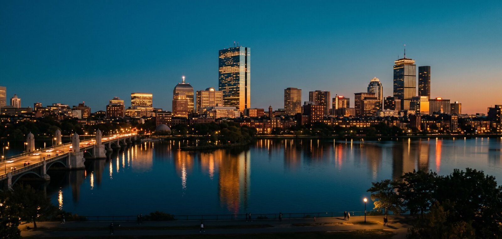 Boston's Back Bay skyline at dusk across the Charles River